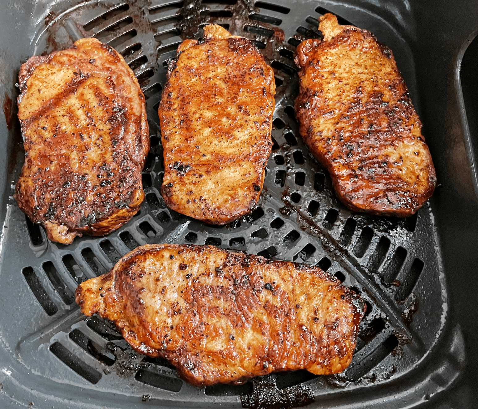 air fryer pork chops in the pan