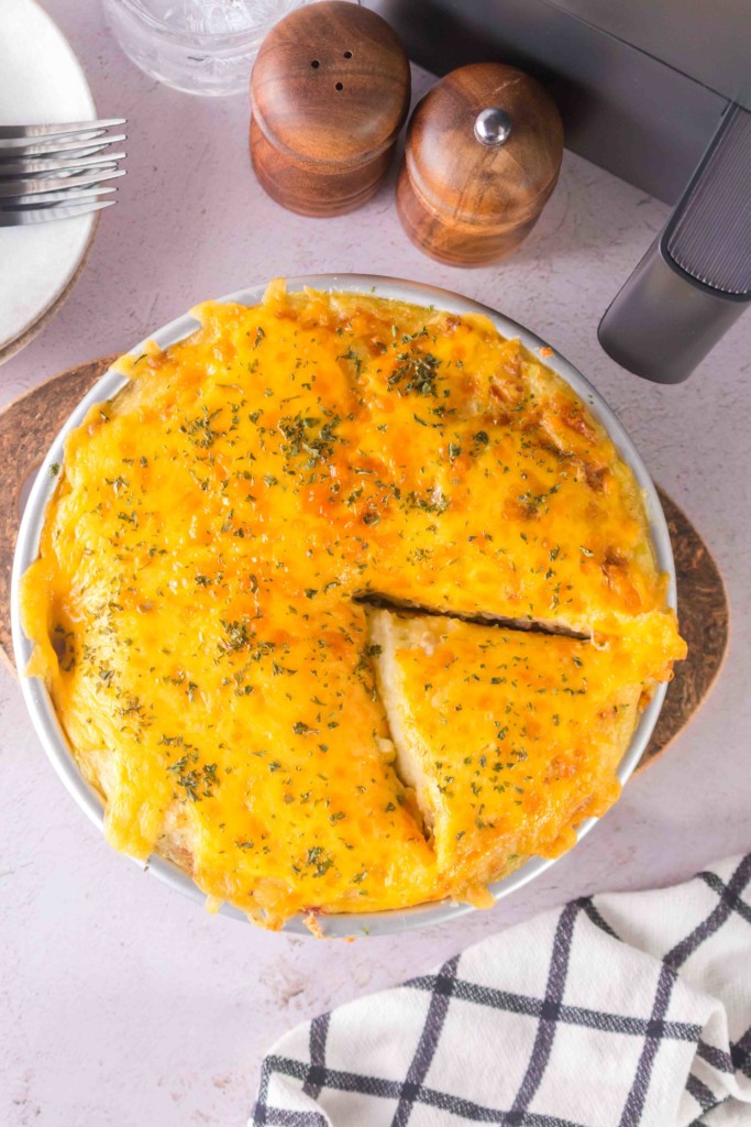 air fryer meatloaf casserole in a pan to serve