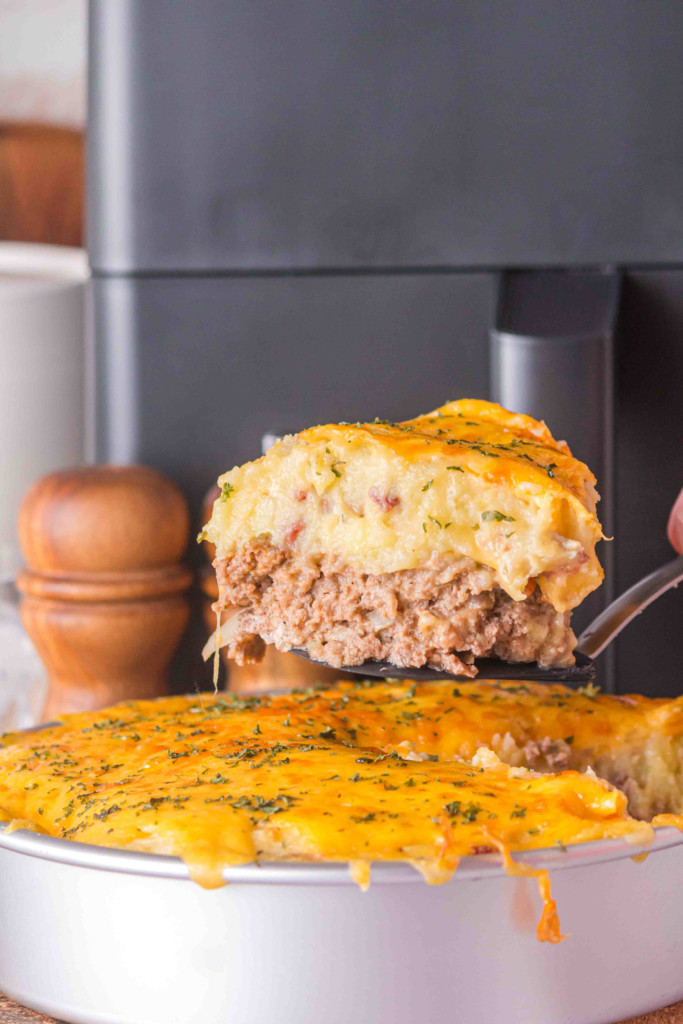 air fryer meatloaf casserole in a pan to serve